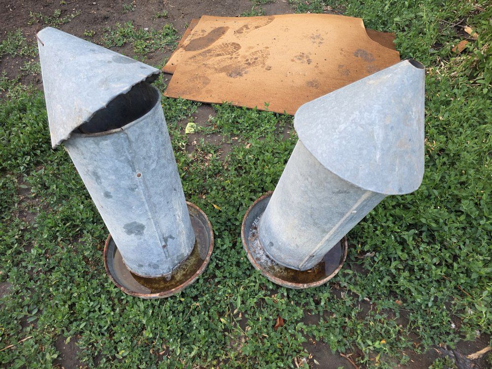 2 - 20lb Oakes galvanized chicken feeders with tops