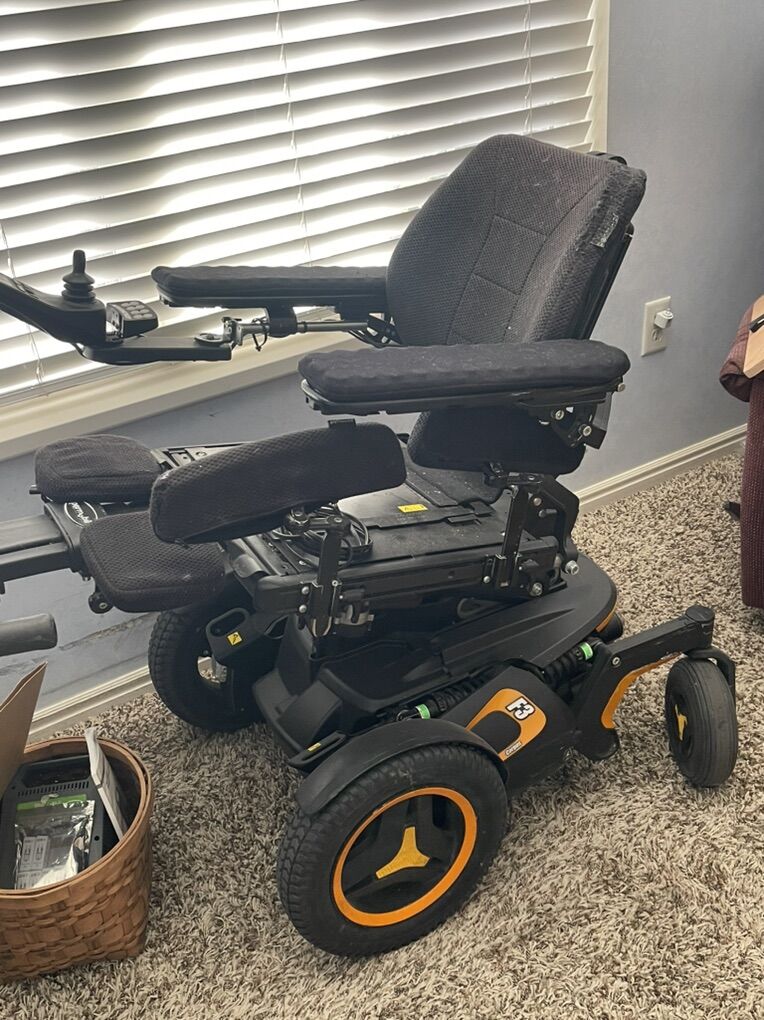 Orange Permobile Power Wheelchair