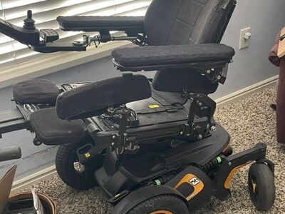 Orange Permobile Power Wheelchair