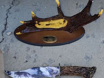 Wild wolf pack bowie, with ornate stand