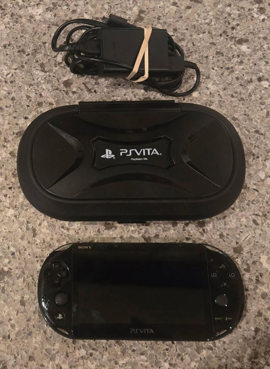 Ps Vita Slim with hard case! trades considered!