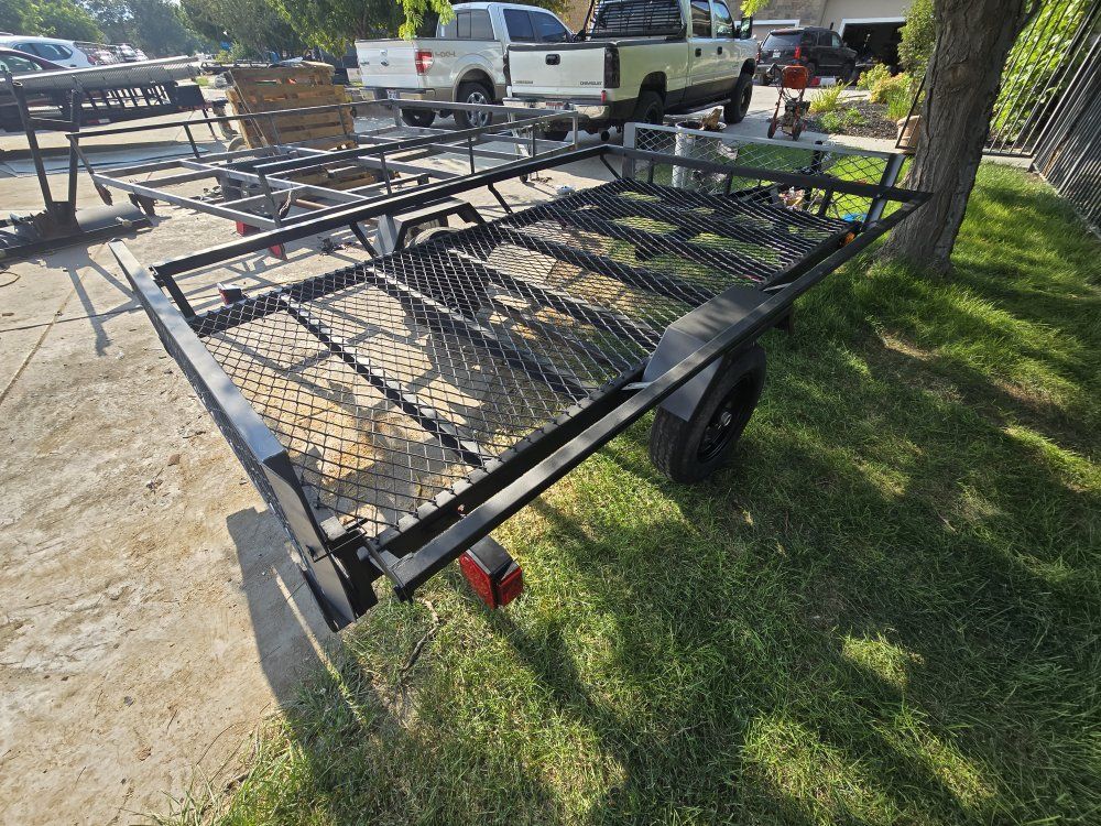 9 ft long x 6'8 wide single axle trailer