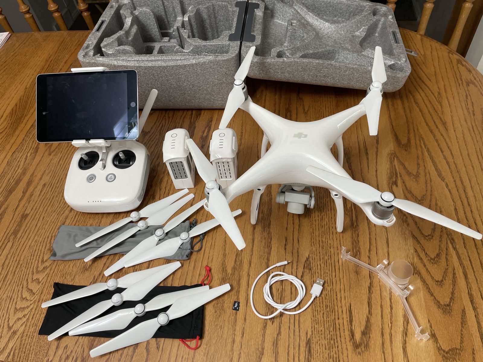 DJI Phantom 4 drone with 128 GB Ipad Mini 4