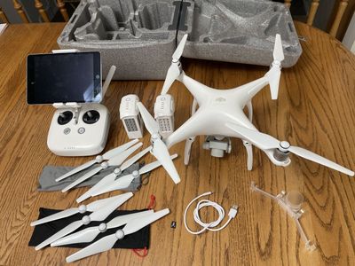 DJI Phantom 4 drone with 128 GB Ipad Mini 4