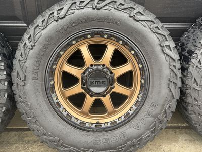 Mickey Thompson Baja Boss 37X12.50R17LT Tires on KMC Bronze Wheels (Set of 4)