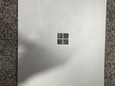 Microsoft Surface Laptop Go + Carrying Case & Charger