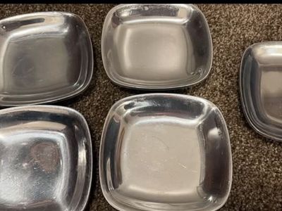 Set of five metal plates/shallow bowls