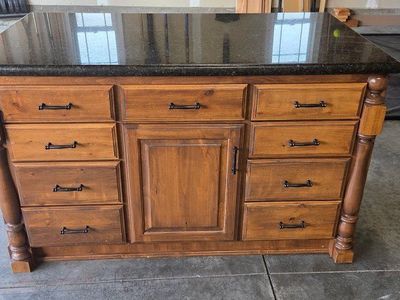 Alder Wood Kitchen Island with Granite Countertop, Drawers, and Built-In Power Outlet