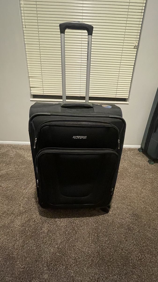 American Tourister Black Rolling Luggage Suitcase
