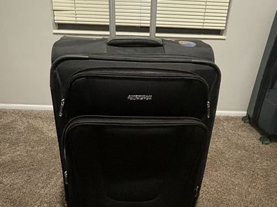 American Tourister Black Rolling Luggage Suitcase
