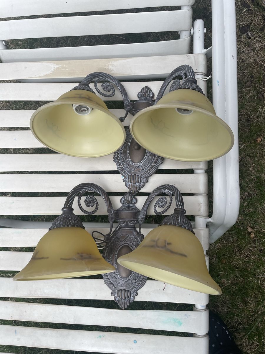 2 like new sconces  very expensive retail