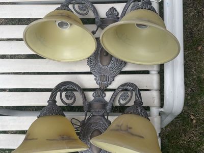 2 like new sconces very expensive retail