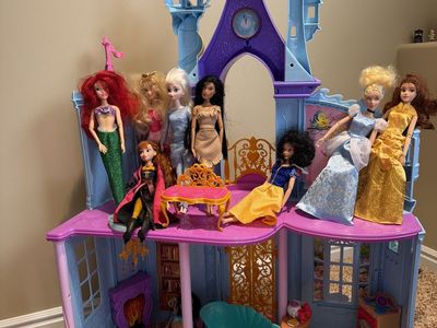 Lot of Disney princess dolls and castle