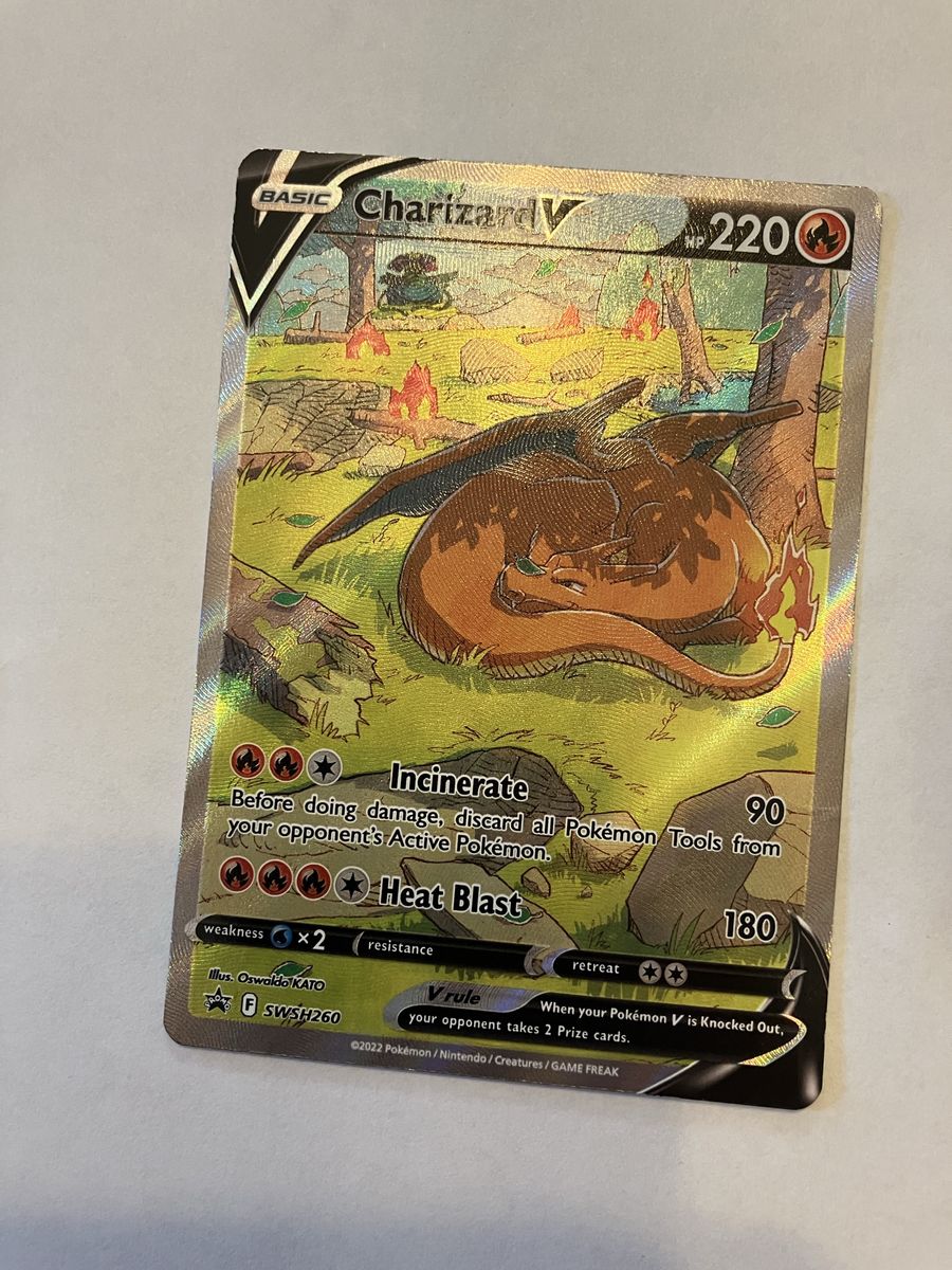 Charizard V Pokémon Card - great condition.