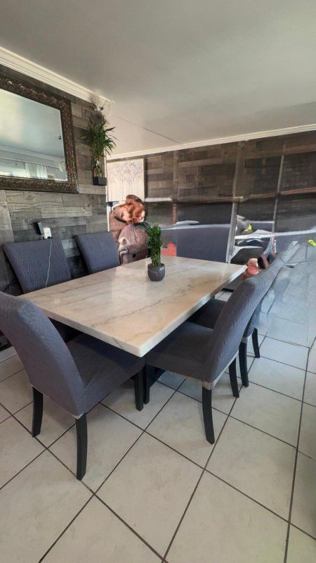Modern Dining Table with Faux Marble Top and 6 Upholstered Chairs - Gray