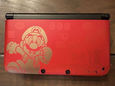Nintendo 3DS XL + Big Hero 6 no charger