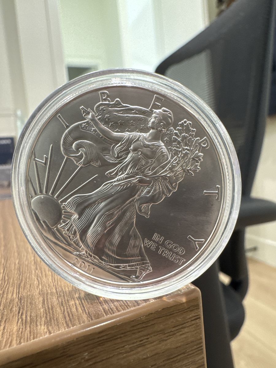 2011 and 2024 American Eagle 1 oz Fine Silver One Dollar Coins in Capsules