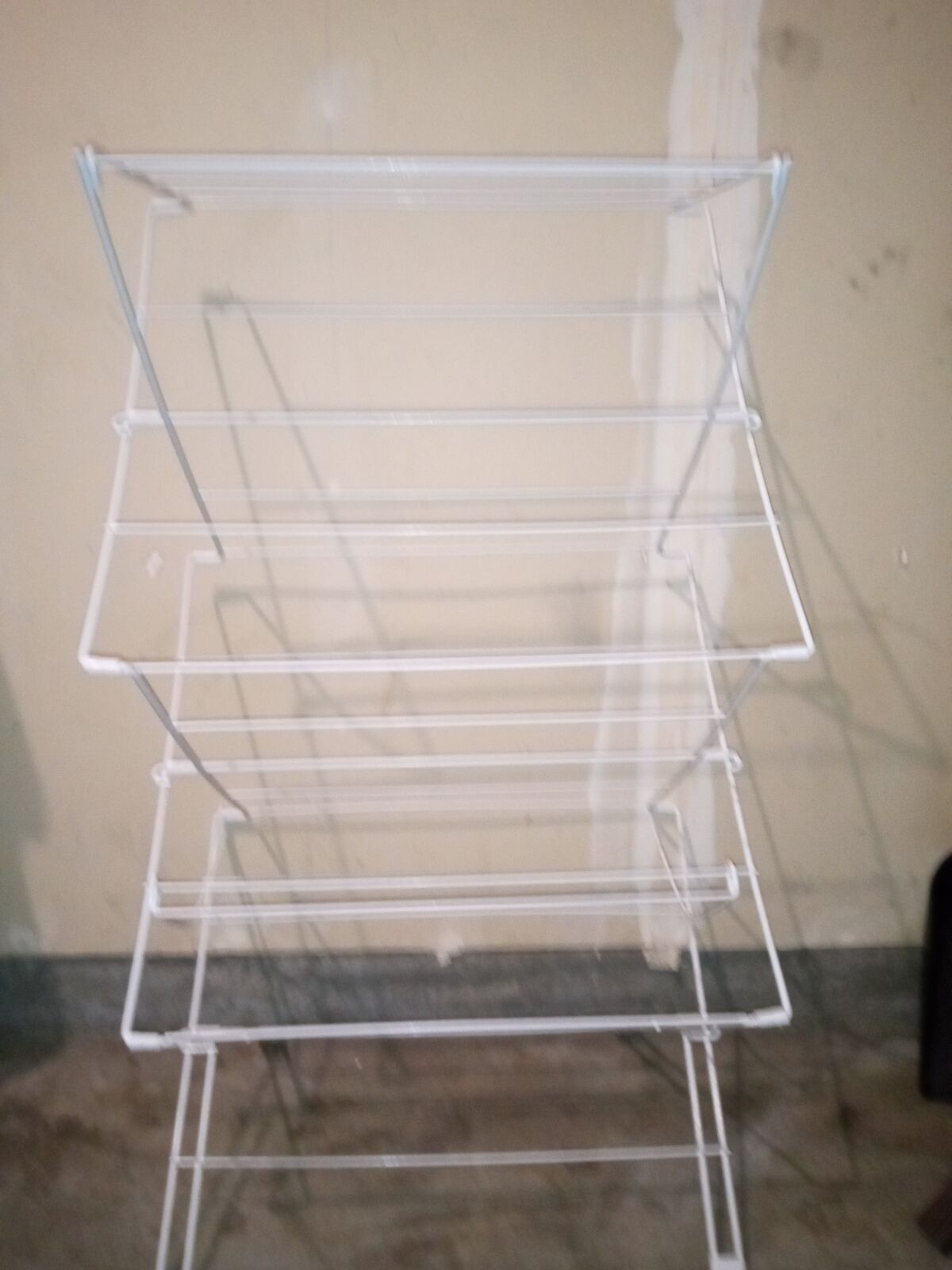 White folding steel dryer rack clothesline