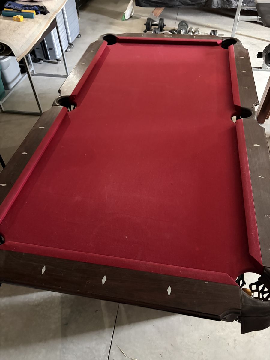 Pool Table with Red Felt and Dark Wood Finish - Good Condition