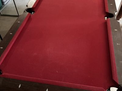 Pool Table with Red Felt and Dark Wood Finish - Good Condition
