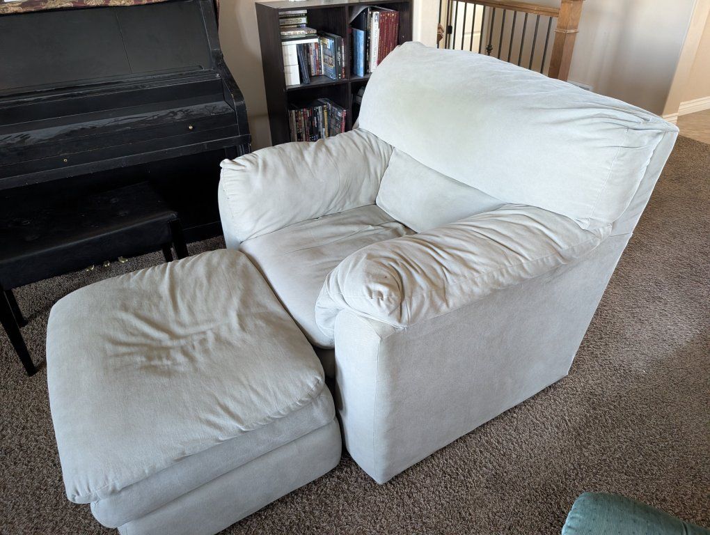 Light Gray Fabric Armchair with Matching Ottoman