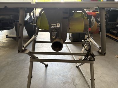 Ryobi RTS12 10-Inch 15-Amp Portable Table Saw with stand.