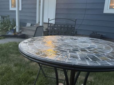 Mosaic tile metal table with foldable metal chairs