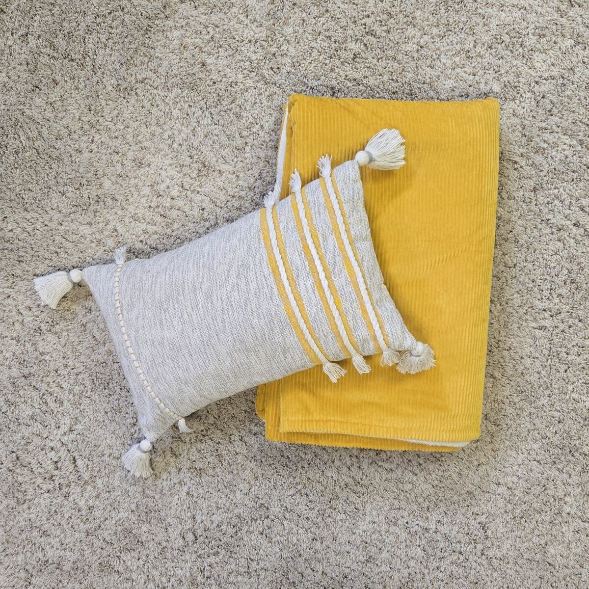 corduroy blanket and tassel pillow