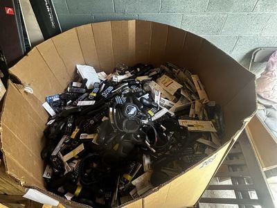 Storage unit clearance sale pallet of remotes