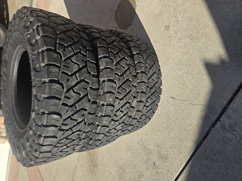 (3) Toyota Open Country R/T Trail tires.