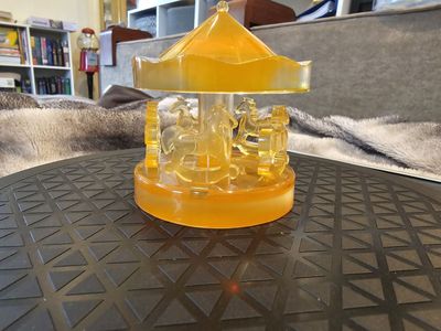 Orange Resin Carousel Figurine with Horses