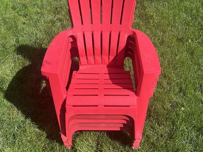 5 Red Plastic Adirondack Chairs