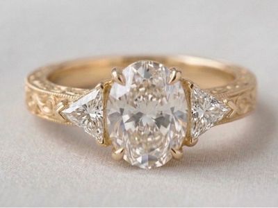 Exquisite Oval & Trillion Engagement Ring