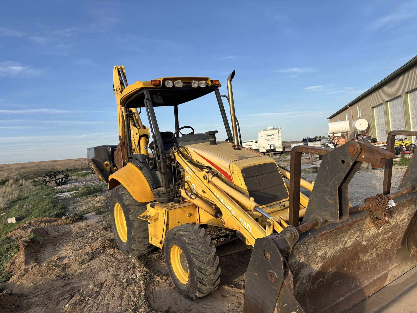 2005 new holland lb75 backhoe