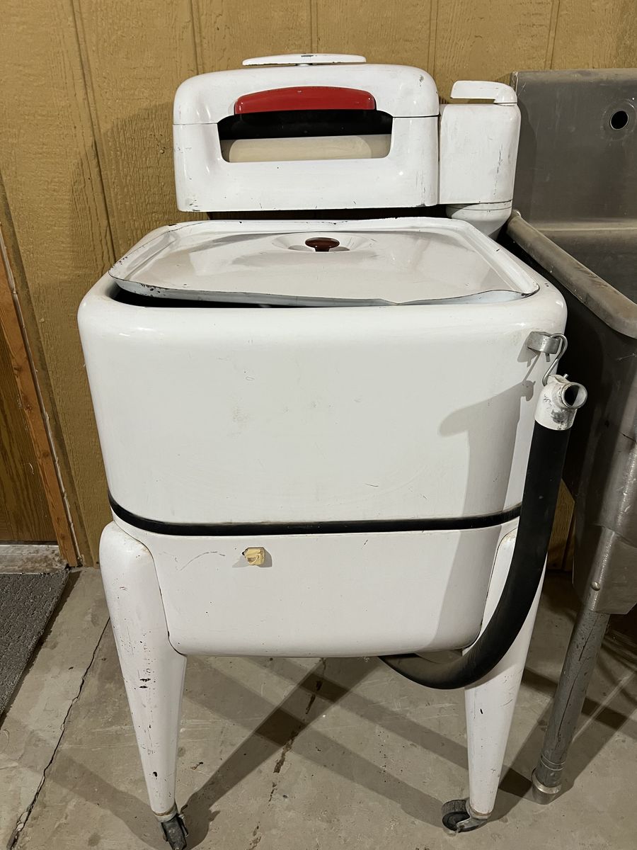 Vintage Maytag Wringer Washer with white enamel finish.
