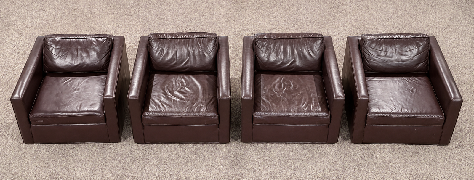 Set of 4 matching dark brown leather lounge/accent chairs