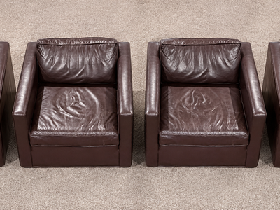 Set of 4 matching dark brown leather lounge/accent chairs