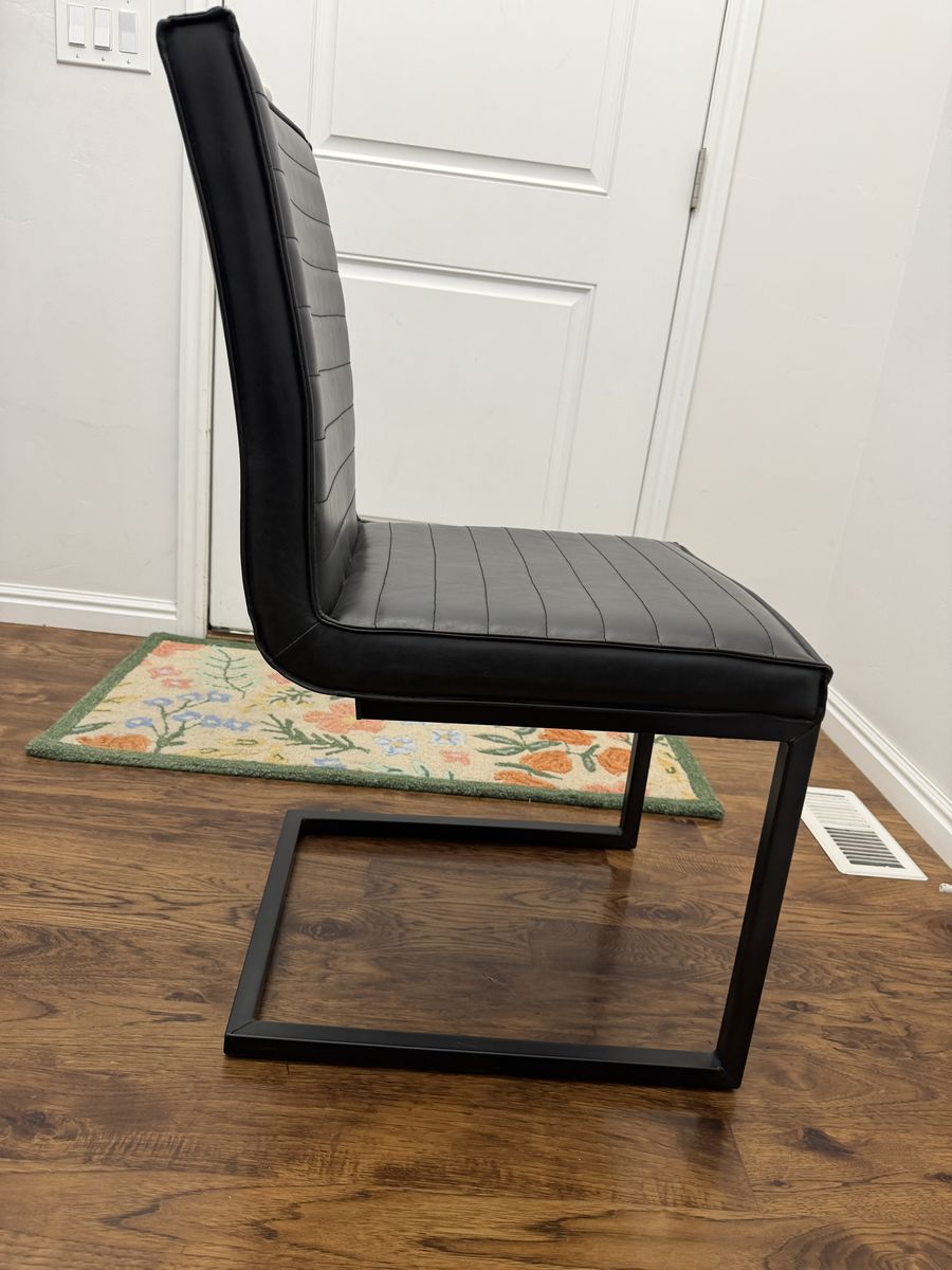 5 black dining chairs