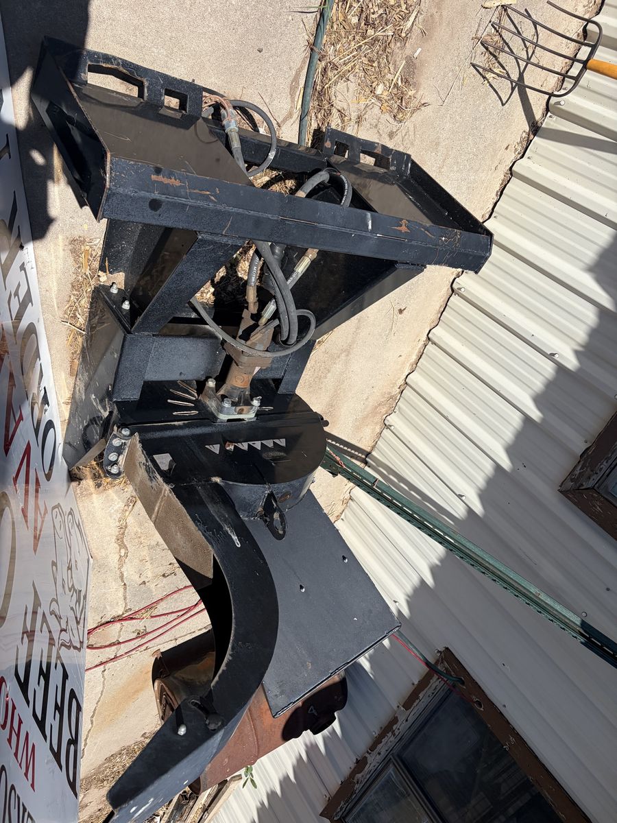Skid loader wood chipper