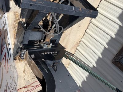Skid loader wood chipper