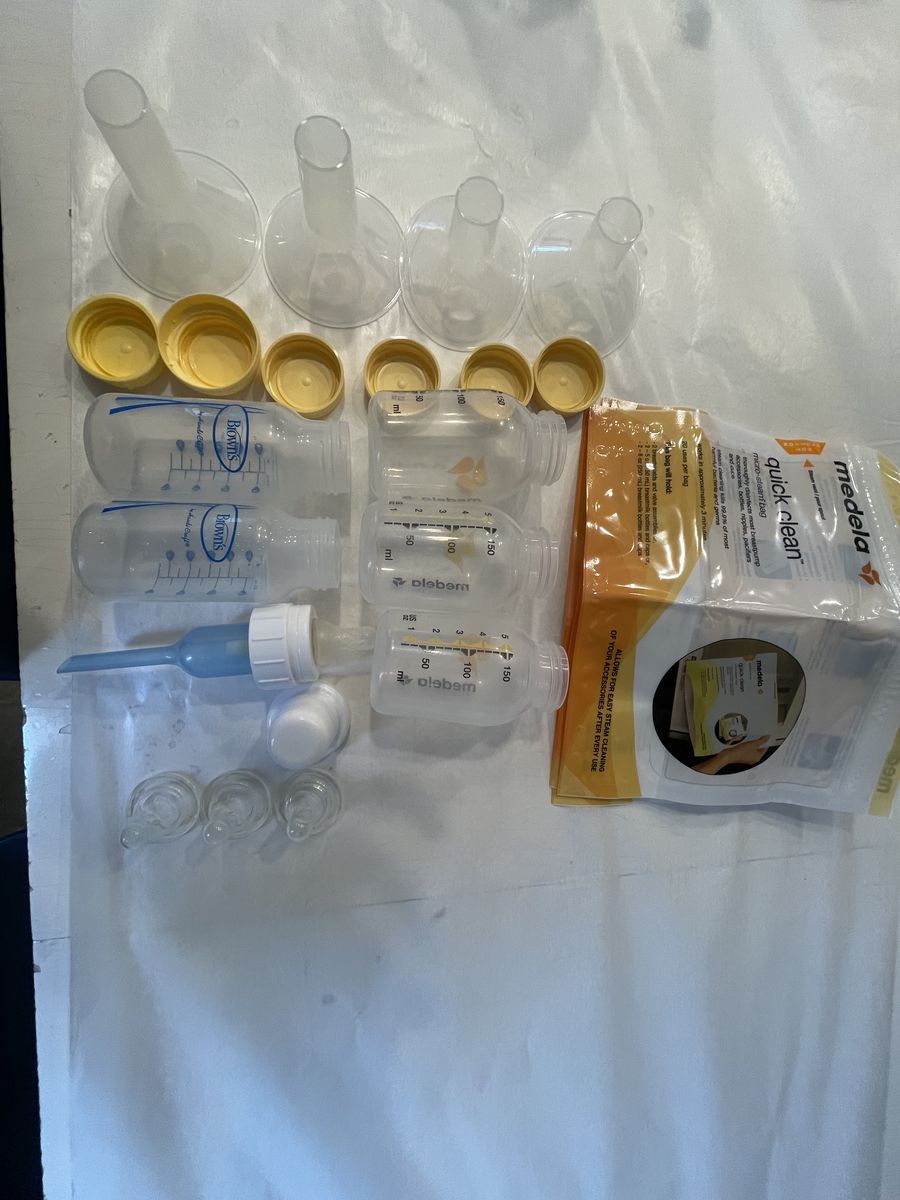 FREE Miscellaneous medela bottles/lids