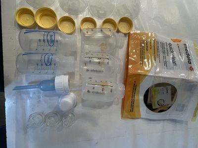 FREE Miscellaneous medela bottles/lids