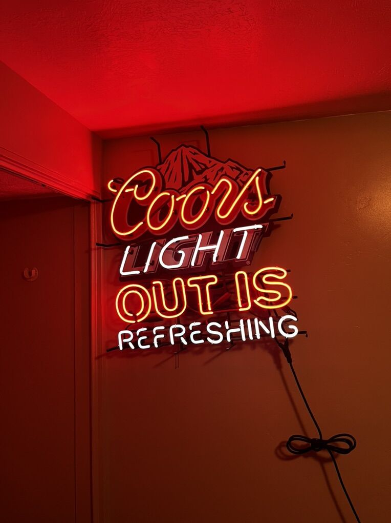 Neon Coors Light Out Is refreshing sign