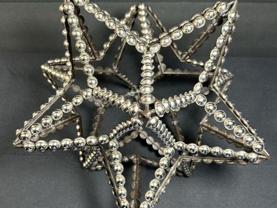3-D 12 point Star Sculpture Silver Metal Studs on Black Metal Frame Geometic