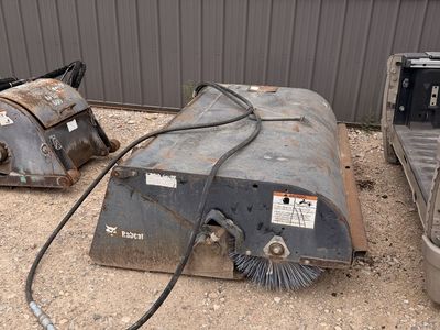 Sweeper skid steer attachment