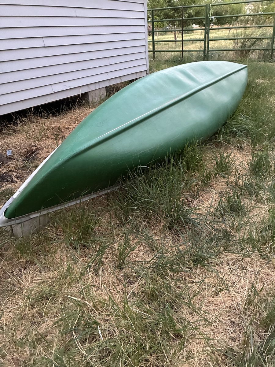 Green Canoe with Aluminum Trim and Gunwales