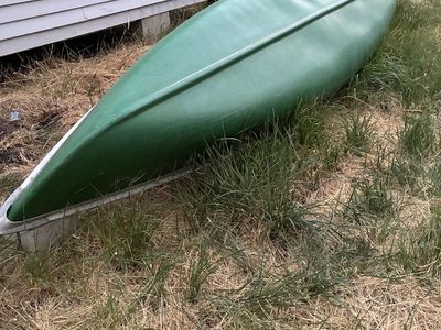Green Canoe with Aluminum Trim and Gunwales