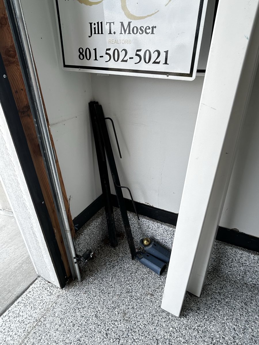 Real estate sign post