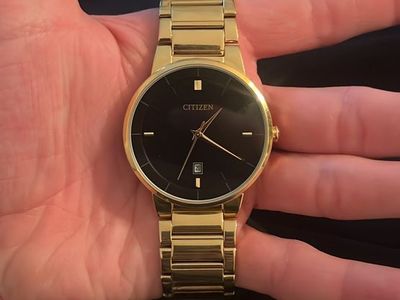 Citizen Gold Tone Black Dial w/ Date