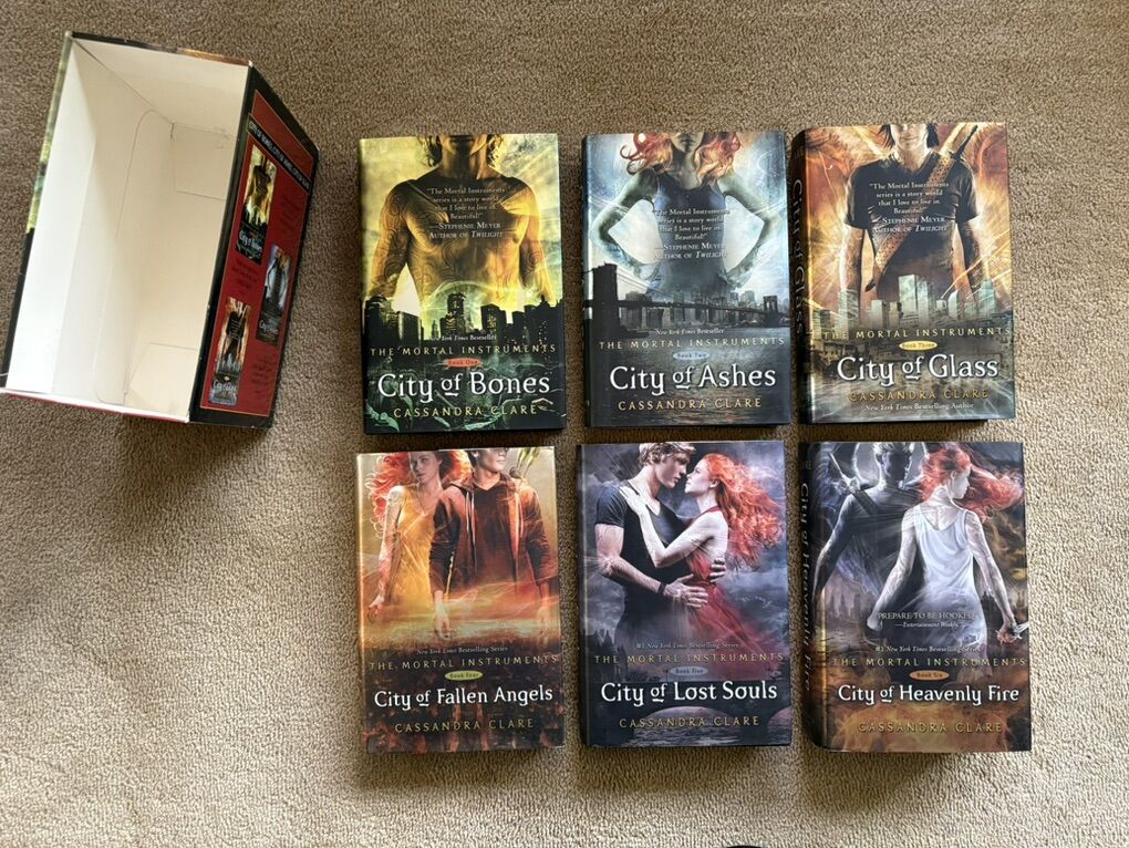 The Mortal Instruments Series 1-6, by Cassandra Clare (hardcovers, partial box set)